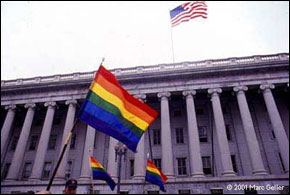 Photo: Rainbow flag flying at 1993 Washington, D.C. gay and lesbian march on Washington. Credit: Marc Geller, 1993