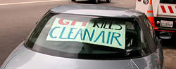 Clean Air banner in back window of car