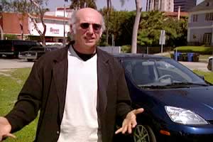 Larry David with his hybrid car